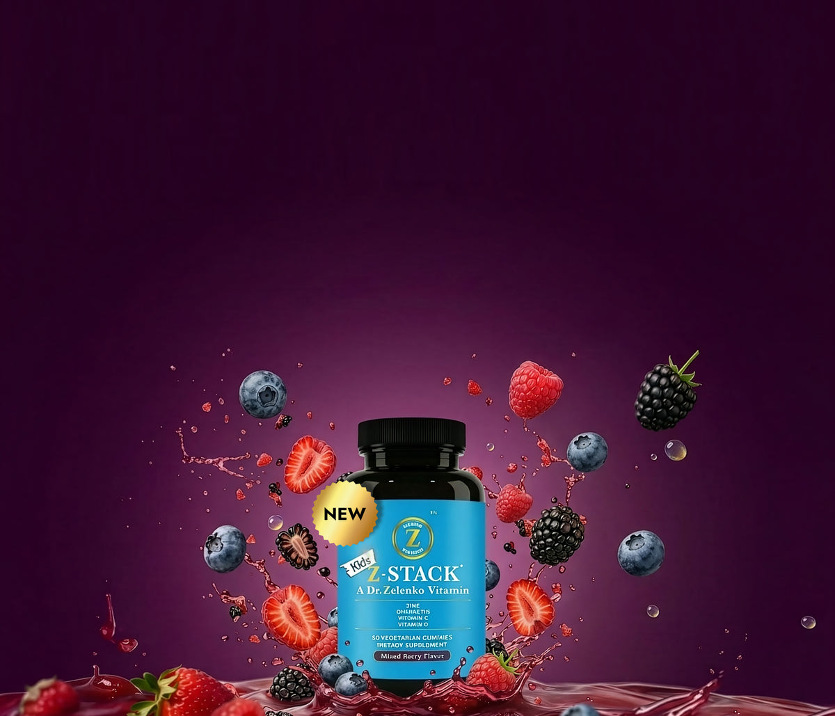 blue bottle of kids z-stack with berries and juice splashing around it on purple background