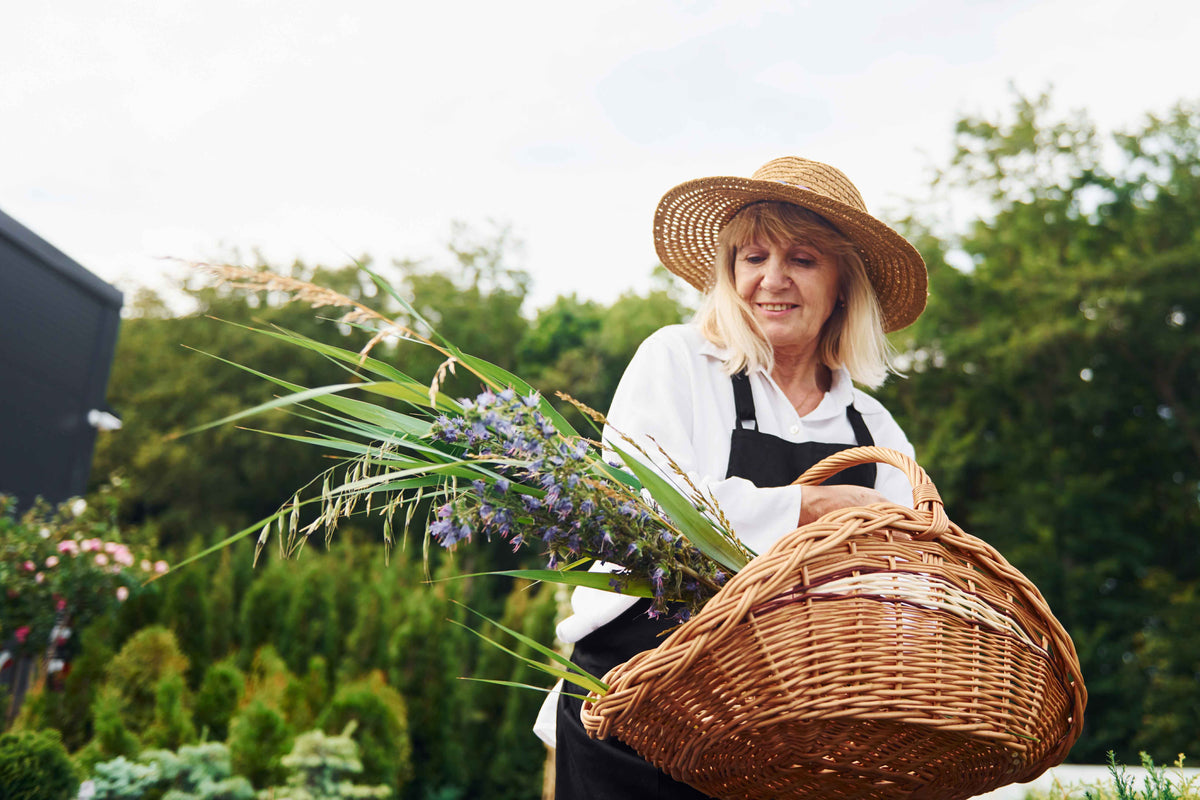 Lady with a wooden basket and wicker hat